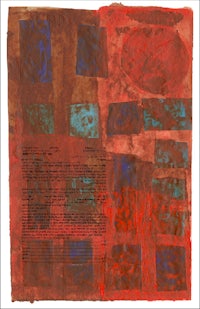 a piece of paper with red and blue squares on it